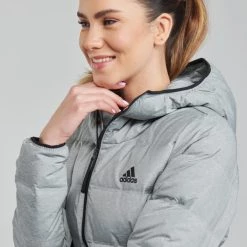 Vêtements Femme Doudounes adidas Performance WEHELIONICMEL Bruyere gris fonce -Manteaux Soldes Magasin 20080735 500 E