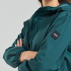 Vêtements Femme Parkas Aigle FLYNRAIN Bleu -Manteaux Soldes Magasin 20100782 500 E